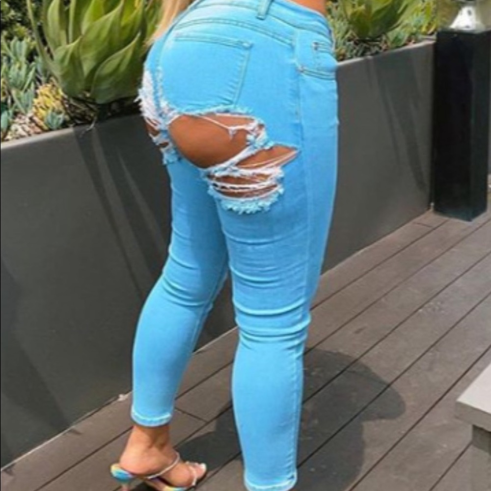 Distressed blue jeans